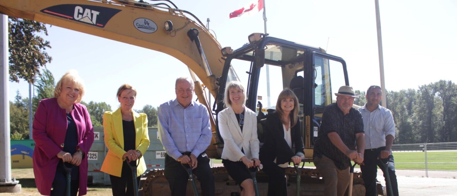 Officials break ground at an athletics centre project in Surrey at Bear Creek Park.
