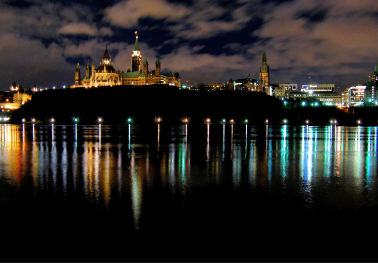 A night shot shows the city of Ottawa.